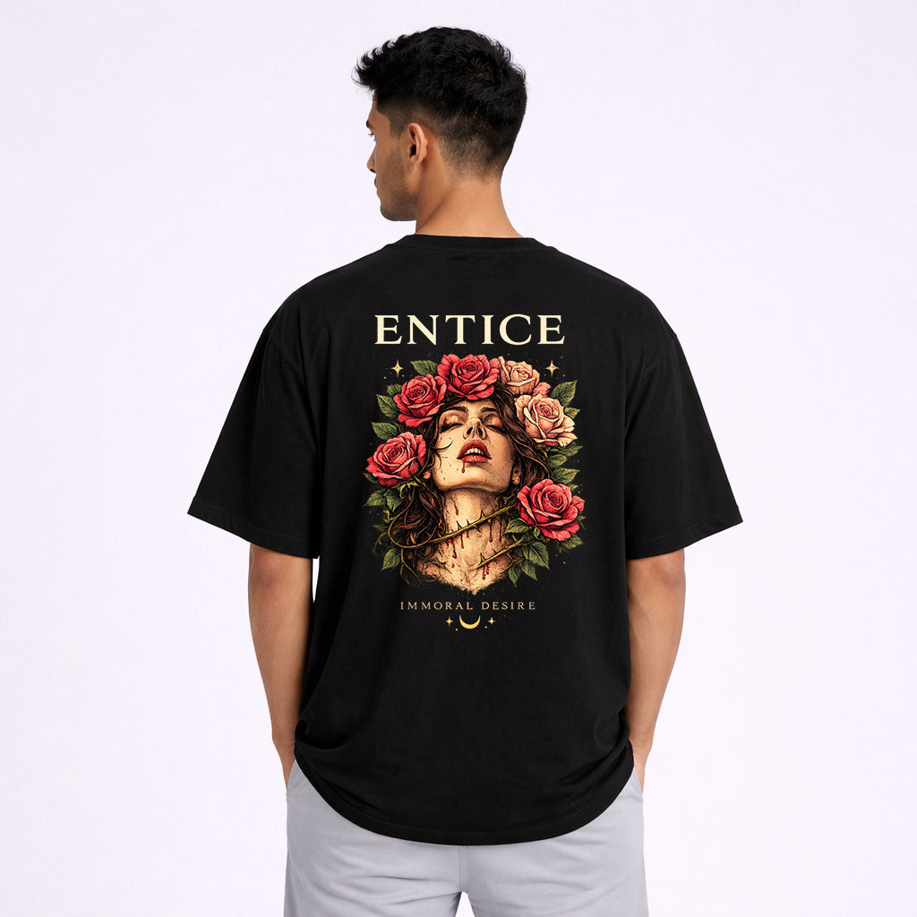 Man wearing Entice Immoral Desire oversized black graphic tshirt back print | Abol Tabol