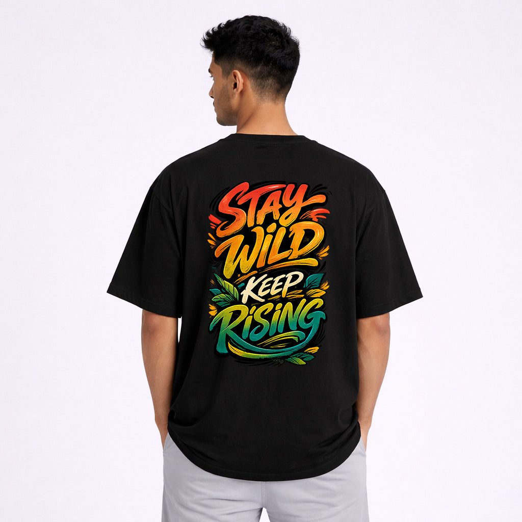 Man wearing Stay Wild Keep Rising oversized black graphic tshirt back print | Abol Tabol